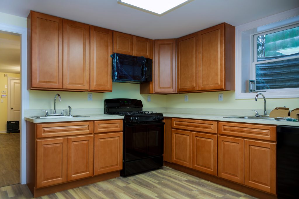 A kitchen with vinyl flooring