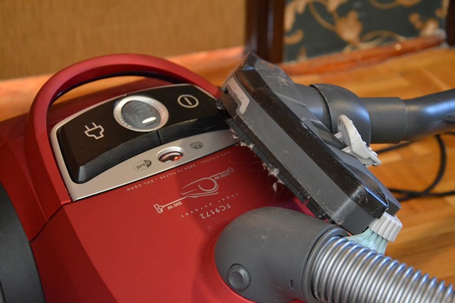 A red corded vacuum cleaner