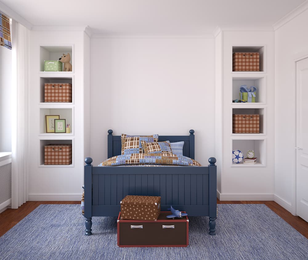 front view of a boy's bedroom with blue carpet