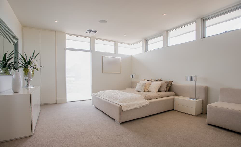 modern white-themed bedroom; best carpet for bedrooms
